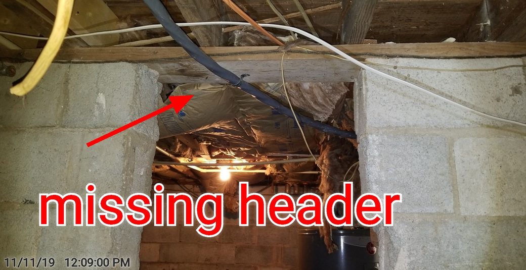 Opening cut between crawlspace sections with no structural header installed