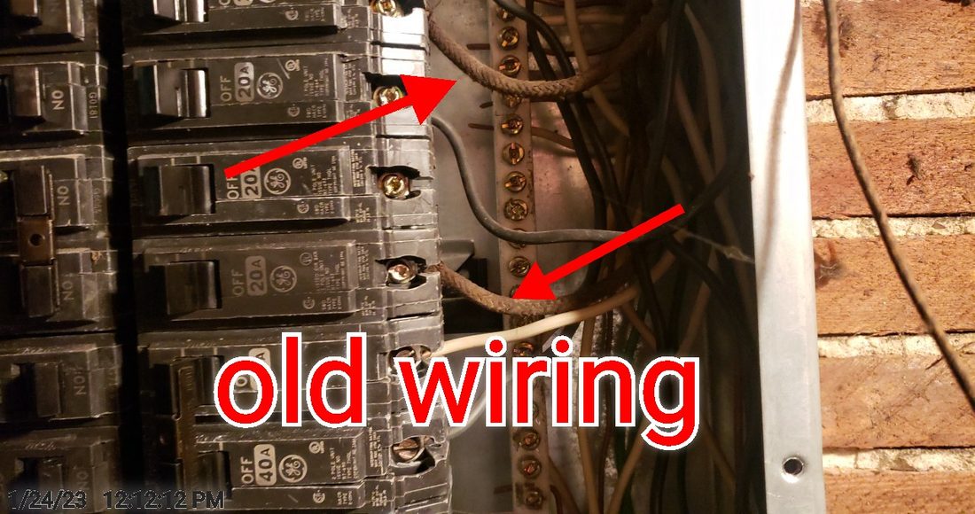 Original cloth-insulated wiring in the electrical panel