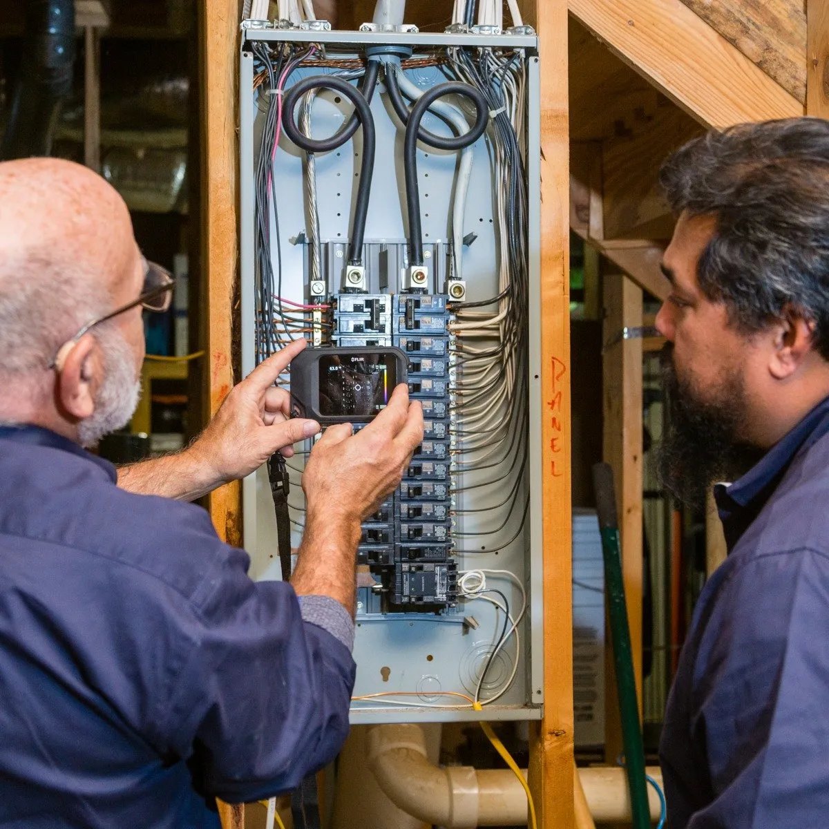 Home inspector examining a roof